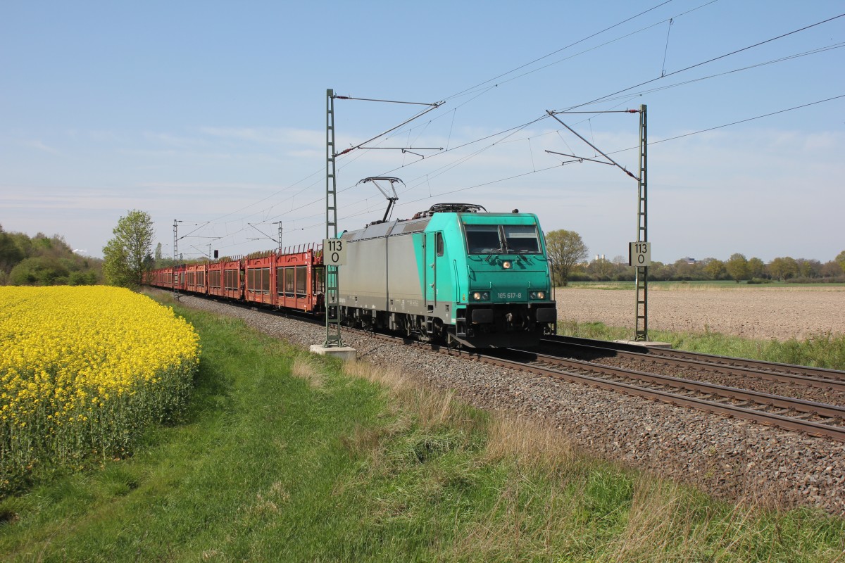 185 617-8 kommt am 17.04.2014 mit Leeren STVA Autotransportwagen durch Bremen Mahndorf gefahren.
