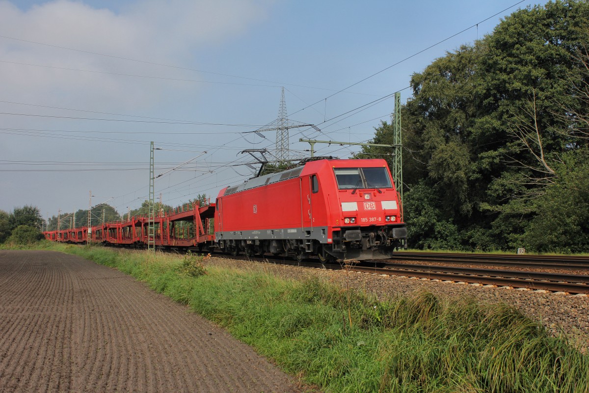 DB 185 387-8 durchfährt am 12.09.2015 in Langwedel-Fört mit einen Leeren Autotransportzug.