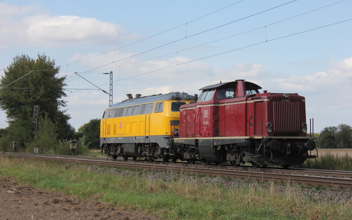 Hier der Schöne Nachschuss in Bremen Mahndorf mit der DB Netze 218 477-8 als Zuglok und die Efw 212 370-1 im Schlepp, sie Fuhren Vorraussichtlich ins AW Bremen am 03.09.2014
