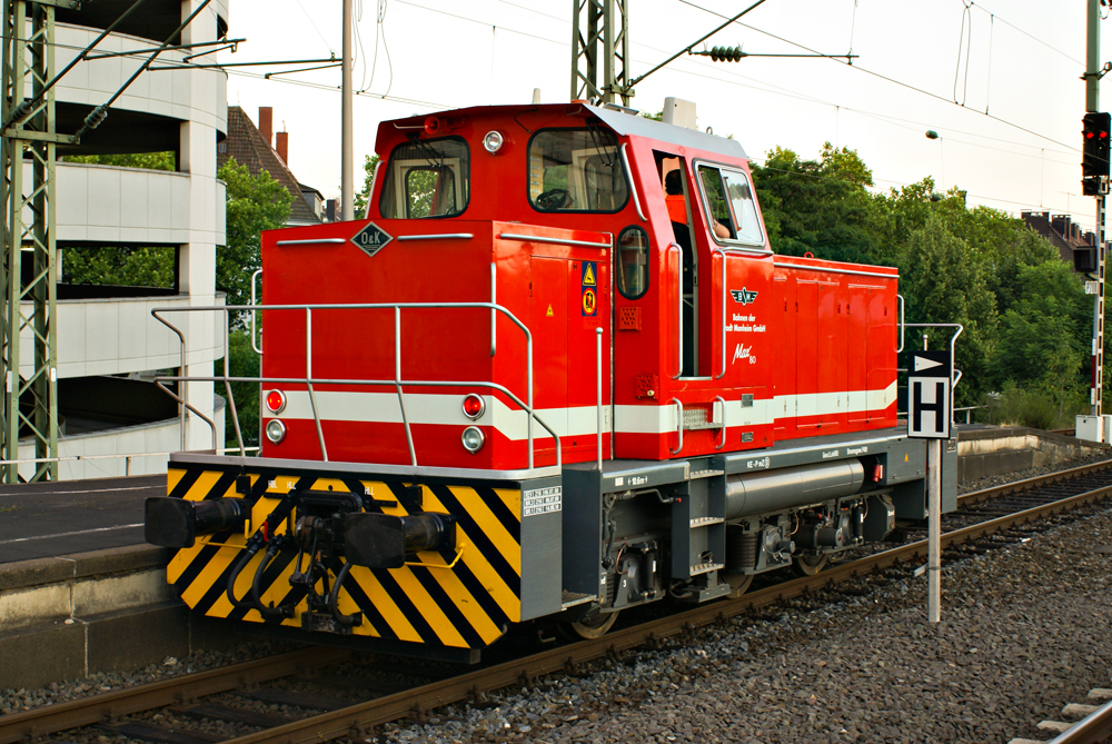 O&K MC700N der Bahnen der Stadt Monheim (BSM). 
DB-Autozug Rangierauftrag im Hauptbahnhof Düsseldorf. 04.07.2010