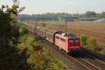 Die Gute alte 140 585-1 kommt mit Ihrem Zug aus Richtung Buchholz am 14.10.2014 auf der Güterumgeung bei Ramelsloh.