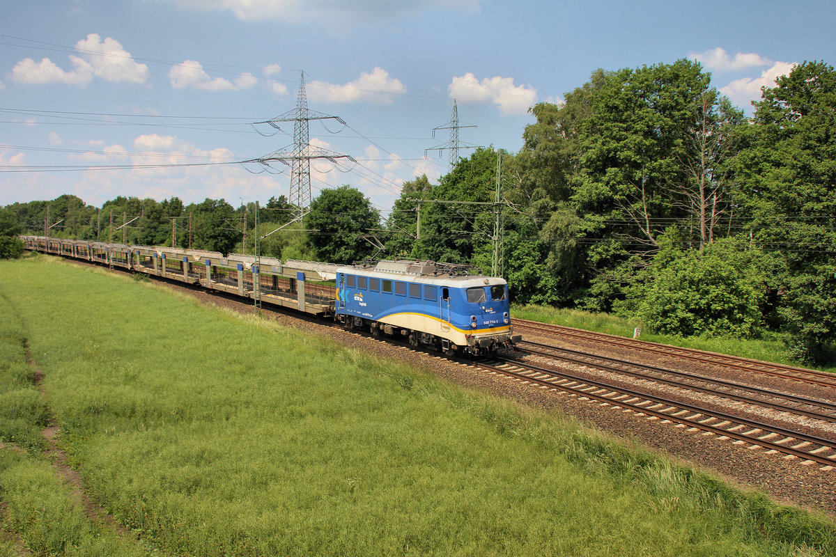 evb logistik 140 774-1 kommt mit dem BLG Leerzug am 04.06.2016 durch Langwedel-Föhrt mit ihrem Leerzug gefahren.