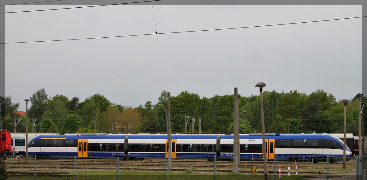 VT 0012 der ehemaligen Ostseelandverlehr GmbH bei Netiniera Neustrelitz am 13.05.2015.
