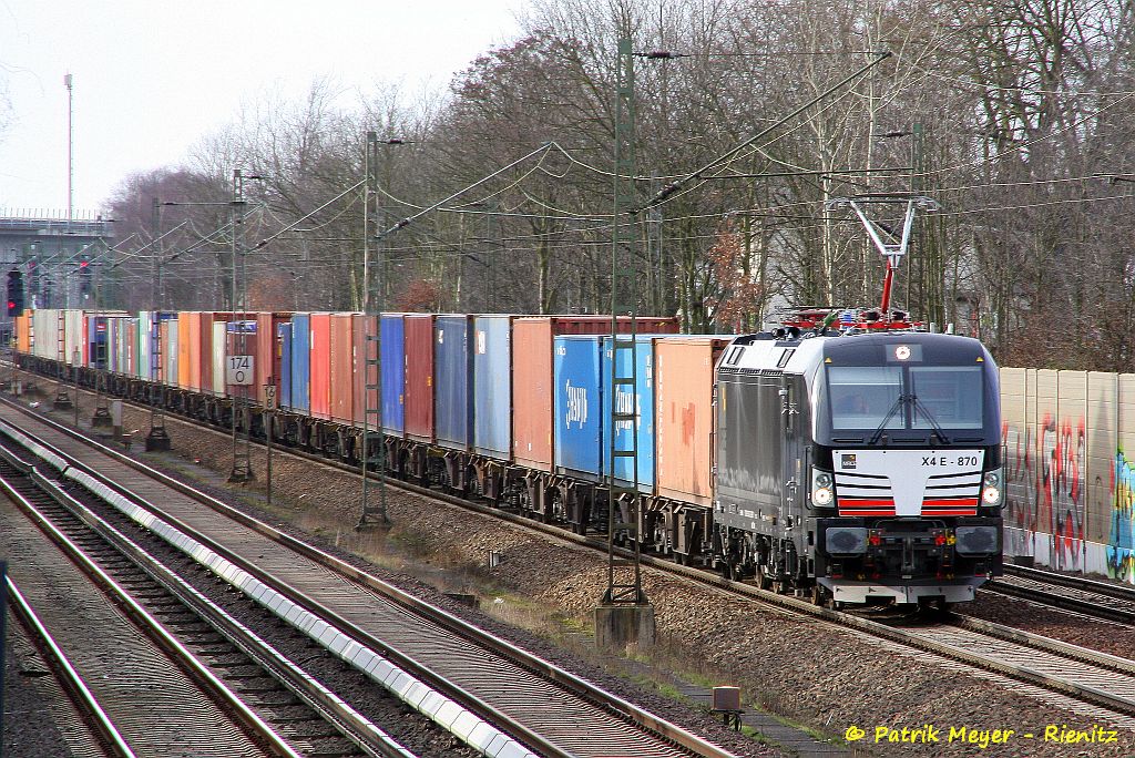 X4E - 870 mit Containerzug am 10.02.2014 in Hamburg-Hausbruch auf dem Weg nach Süden