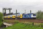 Die 246 011-1 Aktuell seit Anfang des Jahres wieder im Metronom Pool ist, macht sich auf dem Weg nach Cuxhaven und hat gerde die Hamburger Süderelbebrücken überquaert am 09.05.2015