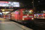 RE nach Bchen am 21.02.2014 mit DB 112 148-2 in Hamburg Hbf auf Gleis 11a.
