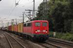 Mit Vollen Containerzug kommt die EGP 140 876-4 am 30.08.2014 durch Hamburg Harburg gefahren.