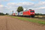 Mit Containerzug kommt die DB 145 049-3 aus Norden am 03.09.2014 bei der Durchfahrt in Bremen Mahndorf.