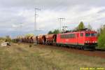 155 265 mit Getreidewagenzug in Berlin-Wuhlheide auf dem Weg nach Westen am 09.04.2014