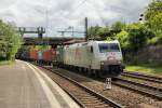 TXL 185 539-4 ist am 13.08.2014 mit einen Containerzug bei der Durchfahrt in Hamburg Harburg.